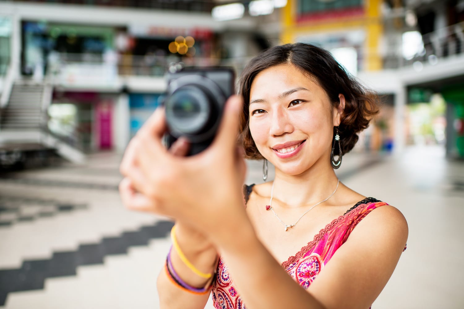 Woman Photographer at the Shopping Mall