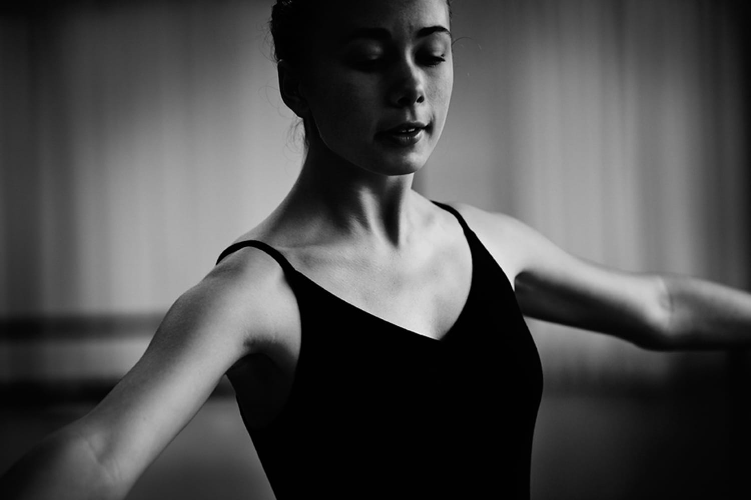 Young woman practicing her ballet dancing