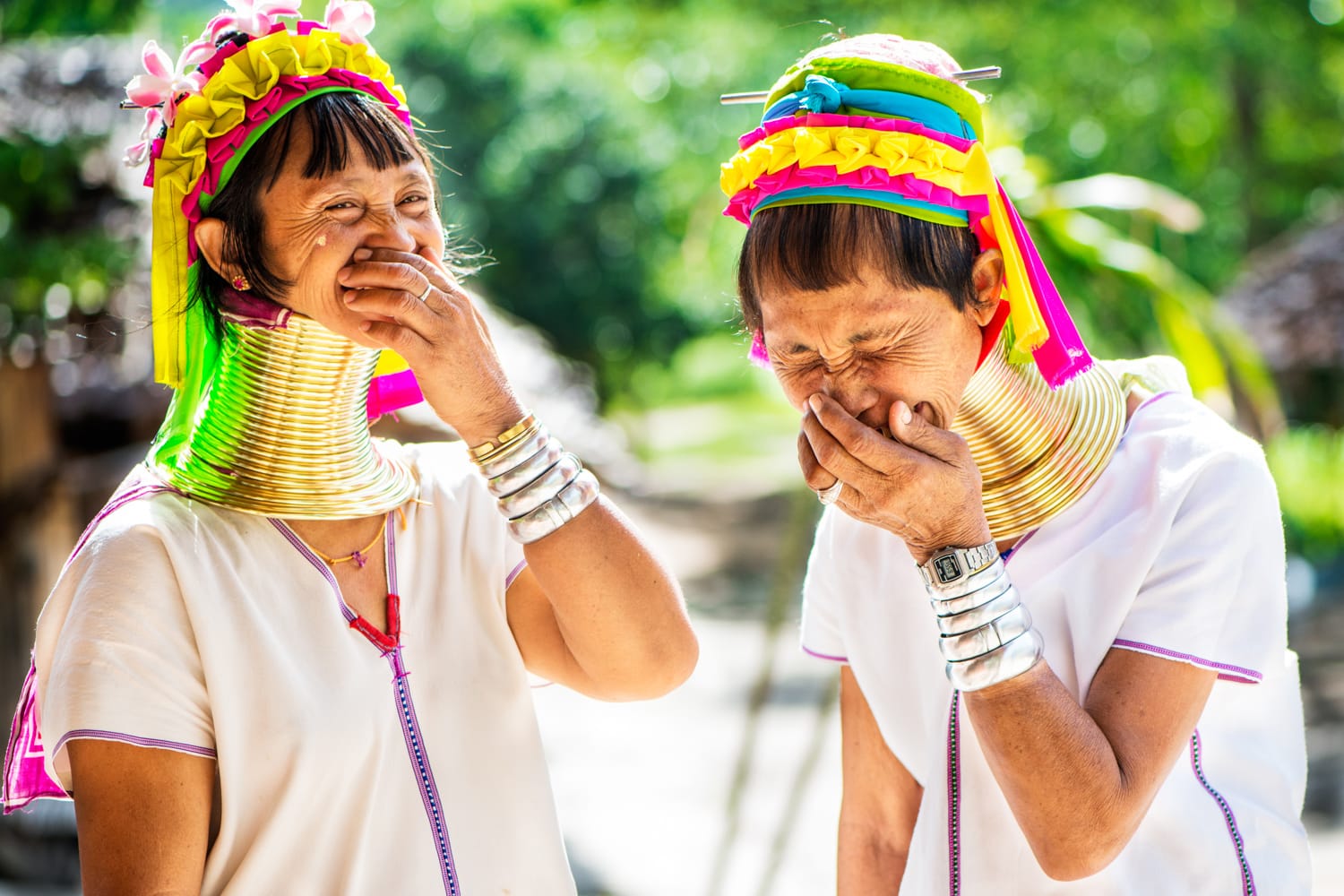 long neck Kayan ladies laughing together