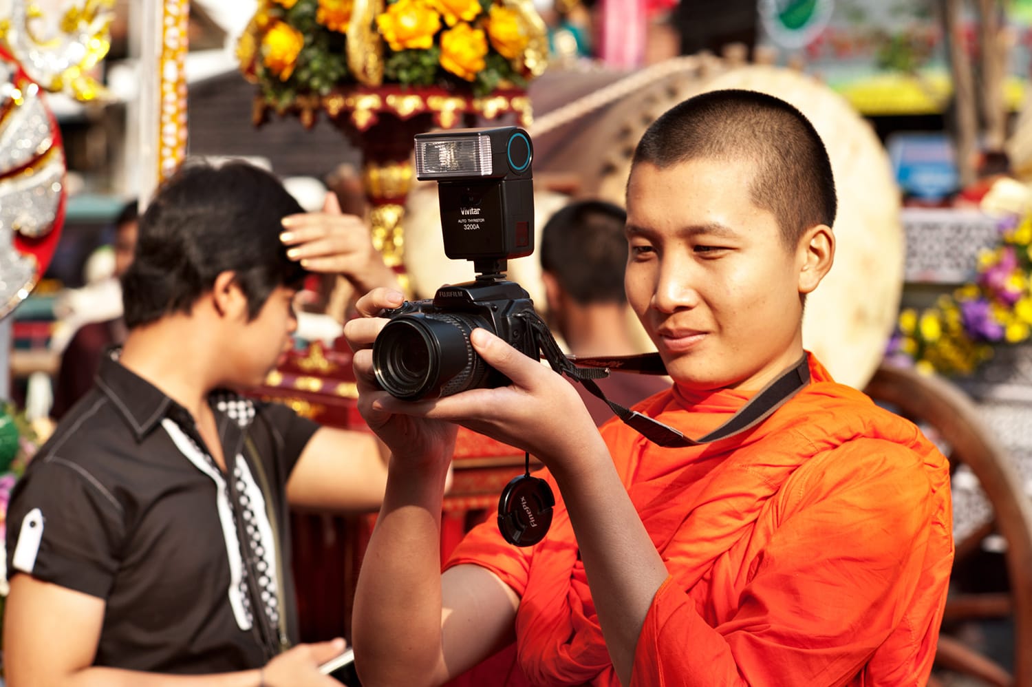 Buddhist Monk With a Camera