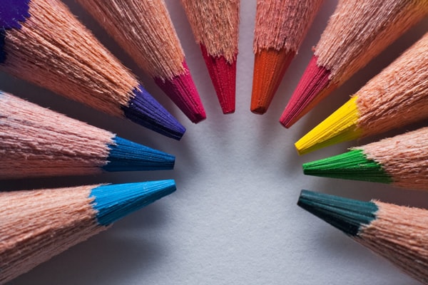 Macro of sharpened colored pencils arranged in a circle