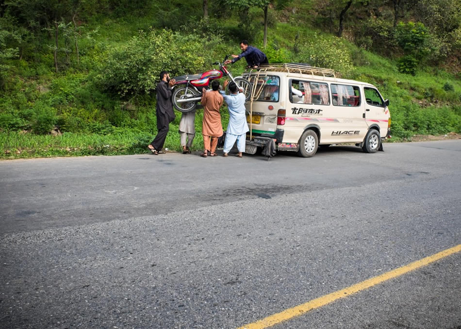 Loading a motor cycle over a van